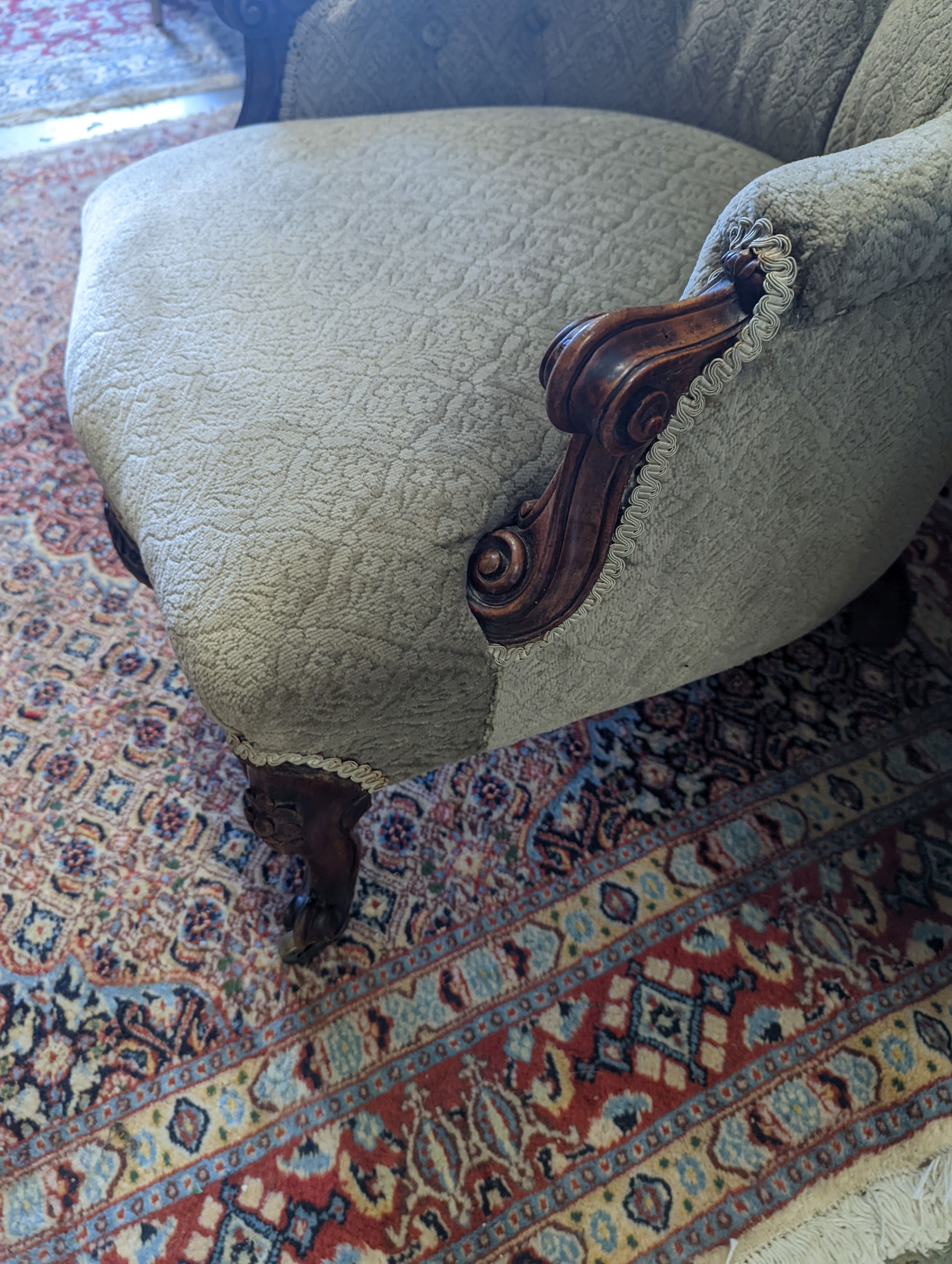 A Victorian carved walnut spoonback chair, width 62cm, depth 75cm, height 80cm